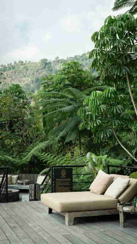 Poolside daybed at Munduk Cabins in Bali, perfect for jungle lounging and mountain views — serene moments captured by Bohemian Bela.
